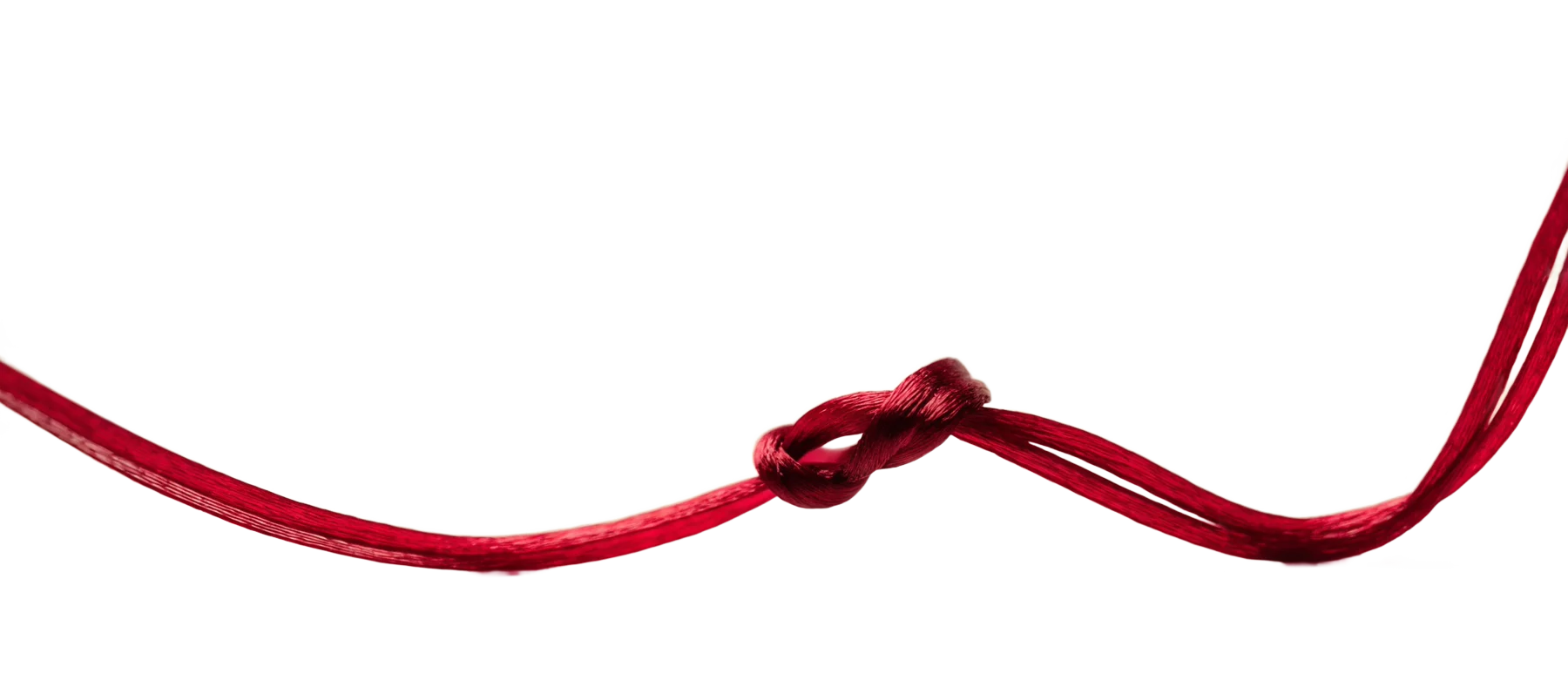 Un hilo rojo con un nudo en el centro